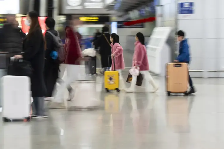 Hành khách ở sân bay Pudong Thượng Hải Ảnh? Qilai Shen/Bloomberg
