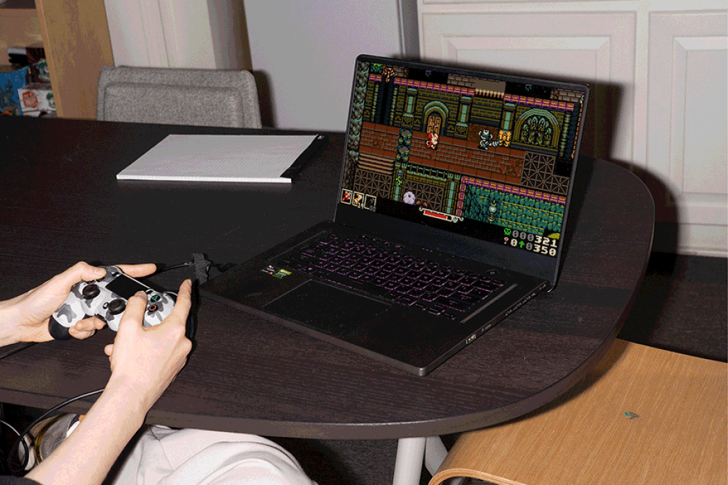 Một nhân viên của Yacht Club Games chơi phiên bản thử nghiệm của Mina the Hollower. Hình ảnh: Jamie Lee Taete for Bloomberg Businessweek 