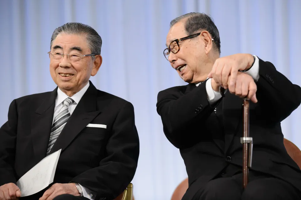 Suzuki, left, with Masatoshi Ito in 2015. Akio Kon_Bloomberg