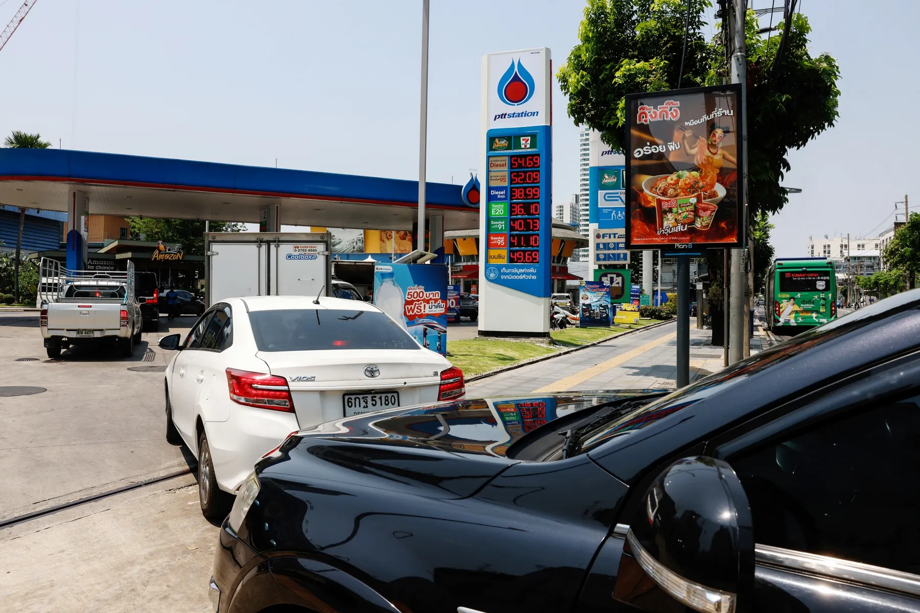Vehicles at a PTT petrol station in Bangkok on March 26. Dario Pignatelli_Bloomberg
